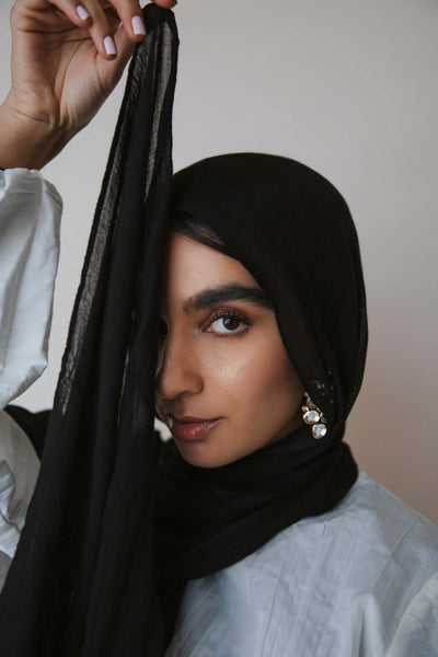 VELA Classic Black hijab in signature modal fabric, offering timeless style and everyday comfort.